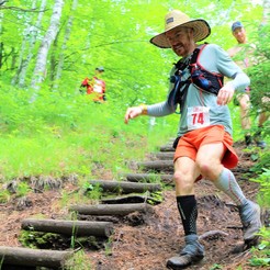 Photo of a runner from one of our guided trail running experiences