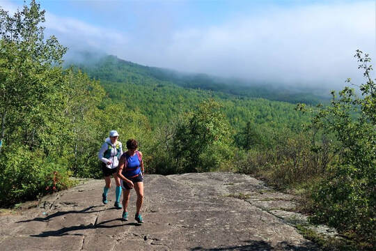 View from of two enjoying one of our guided trail running experiences